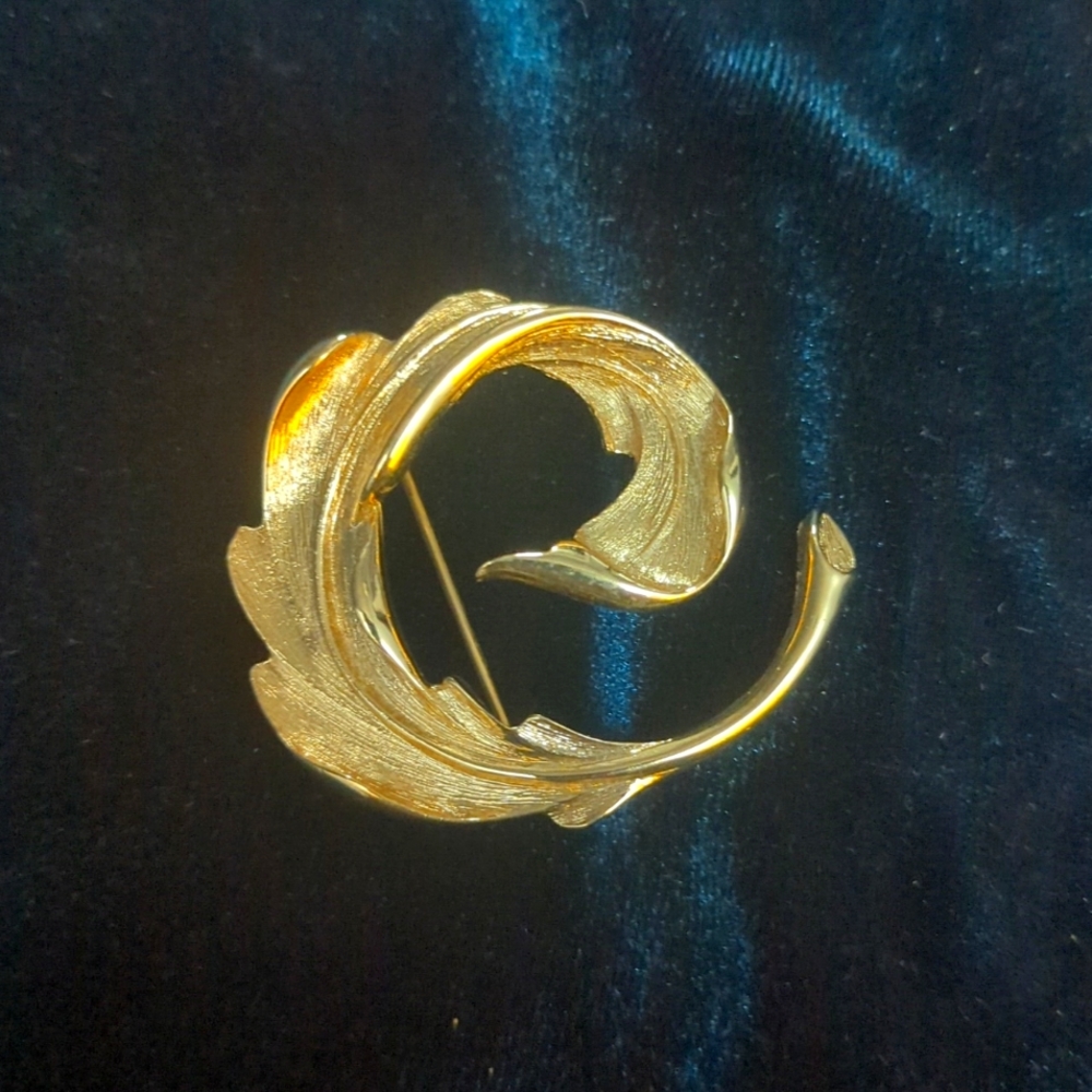 Vintage Monet swirl brooch